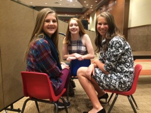 A few of the cutie-petutie models wait backstage before the show begins.